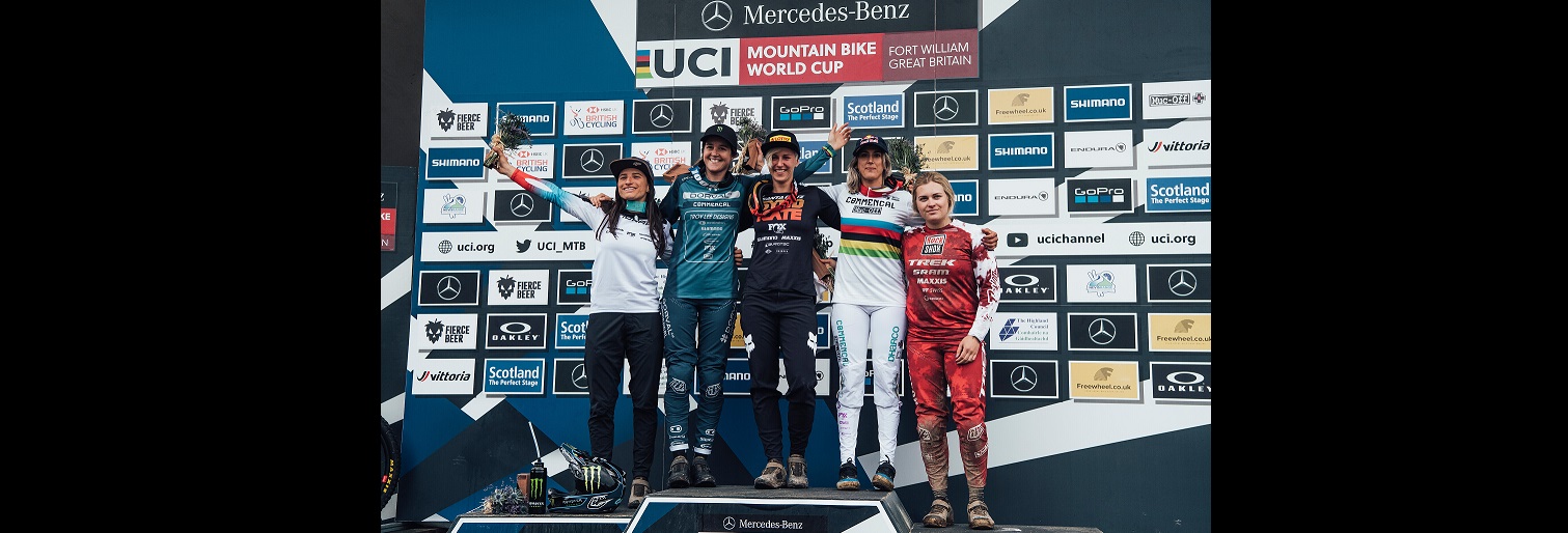 Competitors stand on the podium at UCI DH World Cup in Fort William, United Kingdom on May 22, 2022 // Bartek Wolinski / Red Bull Content Pool // SI202205220726 // Usage for editorial use only //