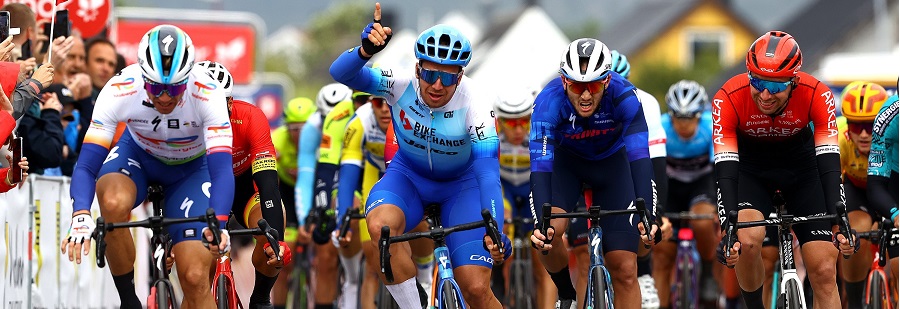 BRONNOYSUND, NORWAY - AUGUST 12: Dylan Groenewegen of Netherlands and Team BikeExchange - Jayco celebrates at finish line as stage winner ahead of Edvald Boasson Hagen of Norway and Team Total Energies (L) and Amaury Capiot of Belgium and Team Arkéa - Samsic (R) during the 9th Arctic Race Of Norway 2022 - Stage 2 a 154,3km stage from Mosjøen to Brønnøysund / #ArcticRace / on August 12, 2022 in Bronnoysund, Norway. (Photo by Michael Steele/Getty Images)